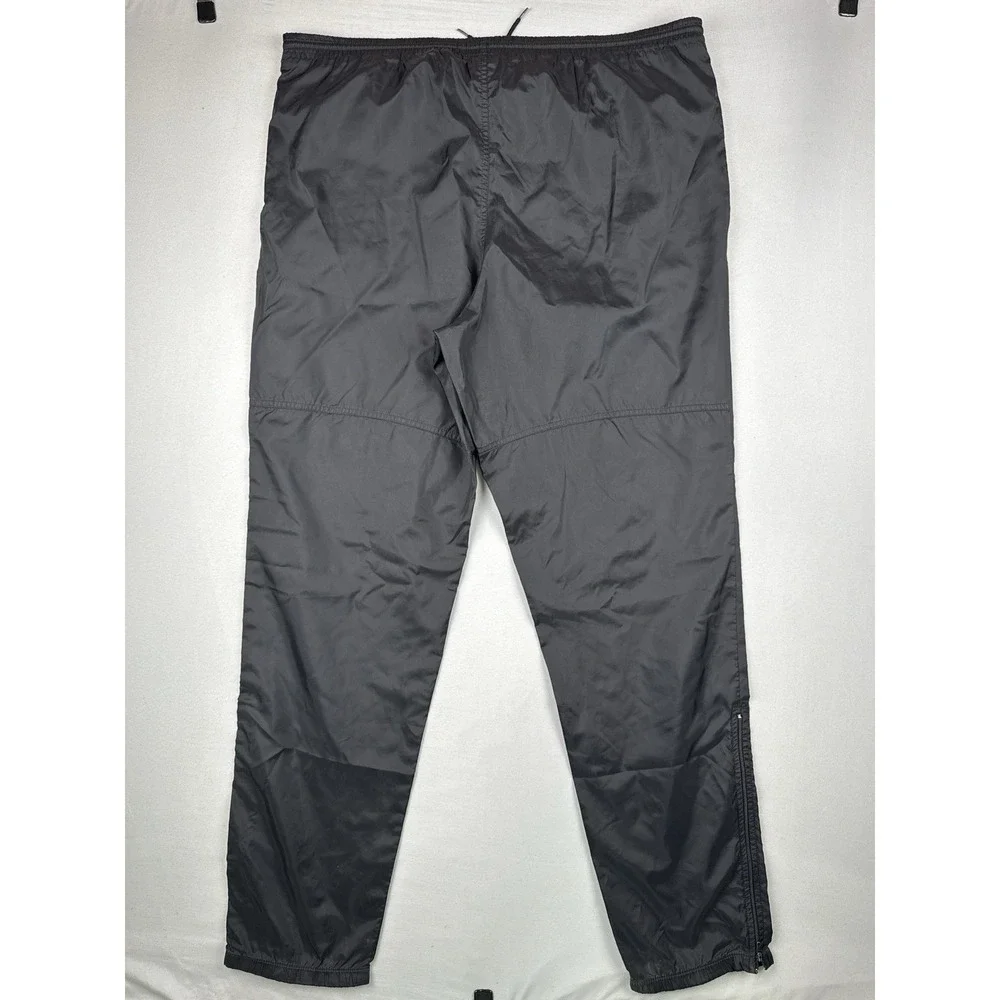Vintage 90s Nike Black Nylon Track Pants Swoosh Zip Leg Windbreaker L